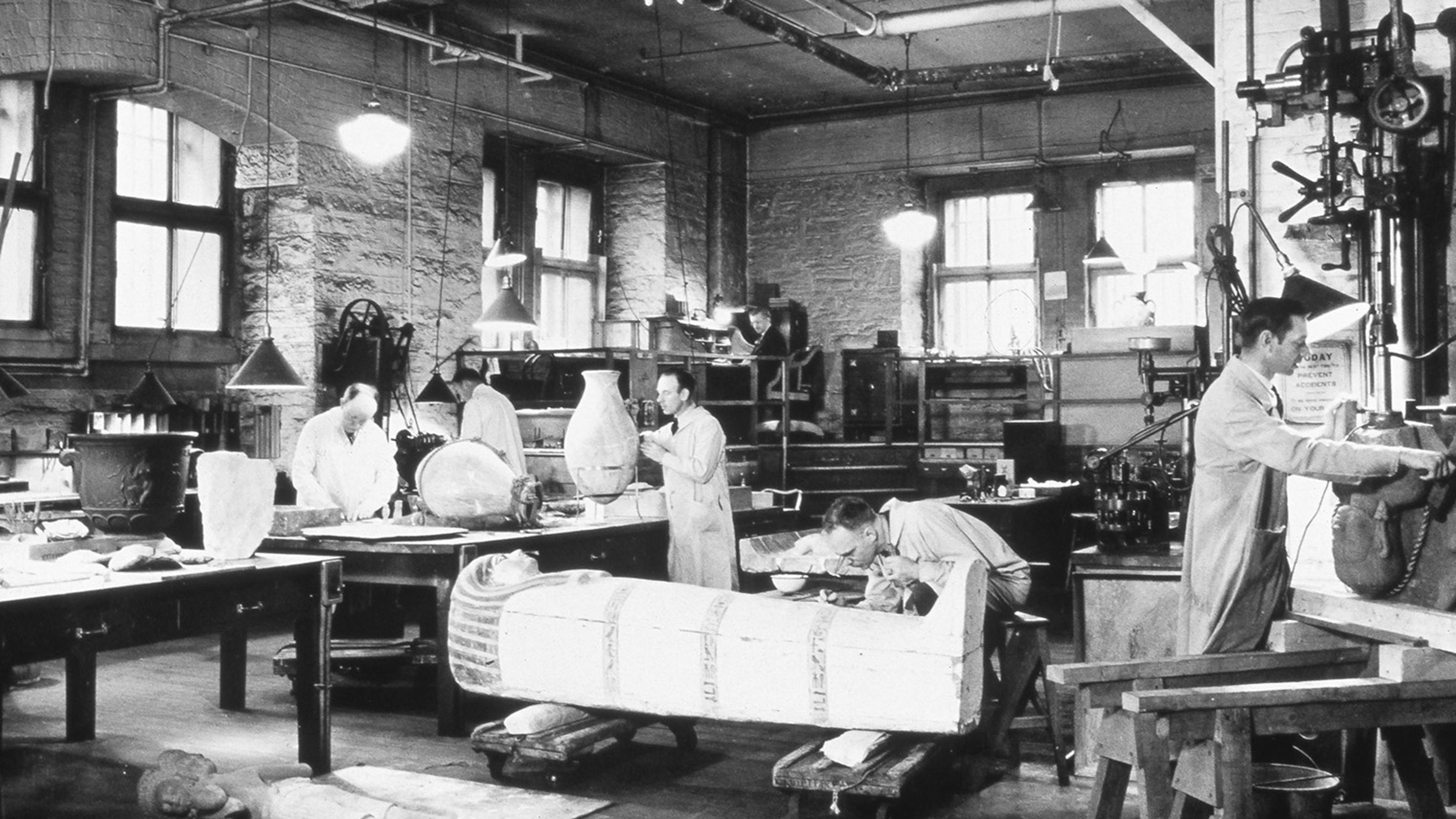 Objects conservators working in the Museum's repair shop in 1936.